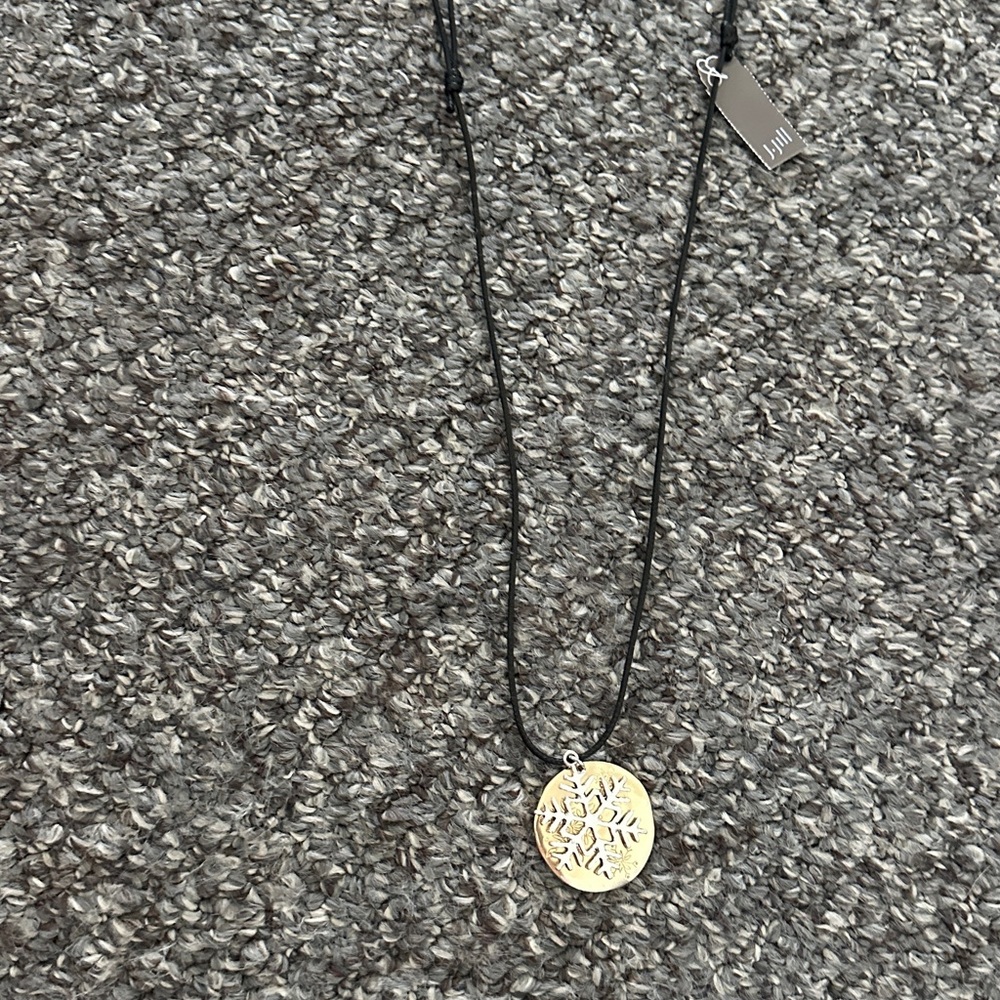 NWT J. Jill snowflake necklace with gold and silver on adjustable black cord